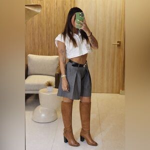 Brown leather knee high riding boot with heels 
Equestrian riding festival